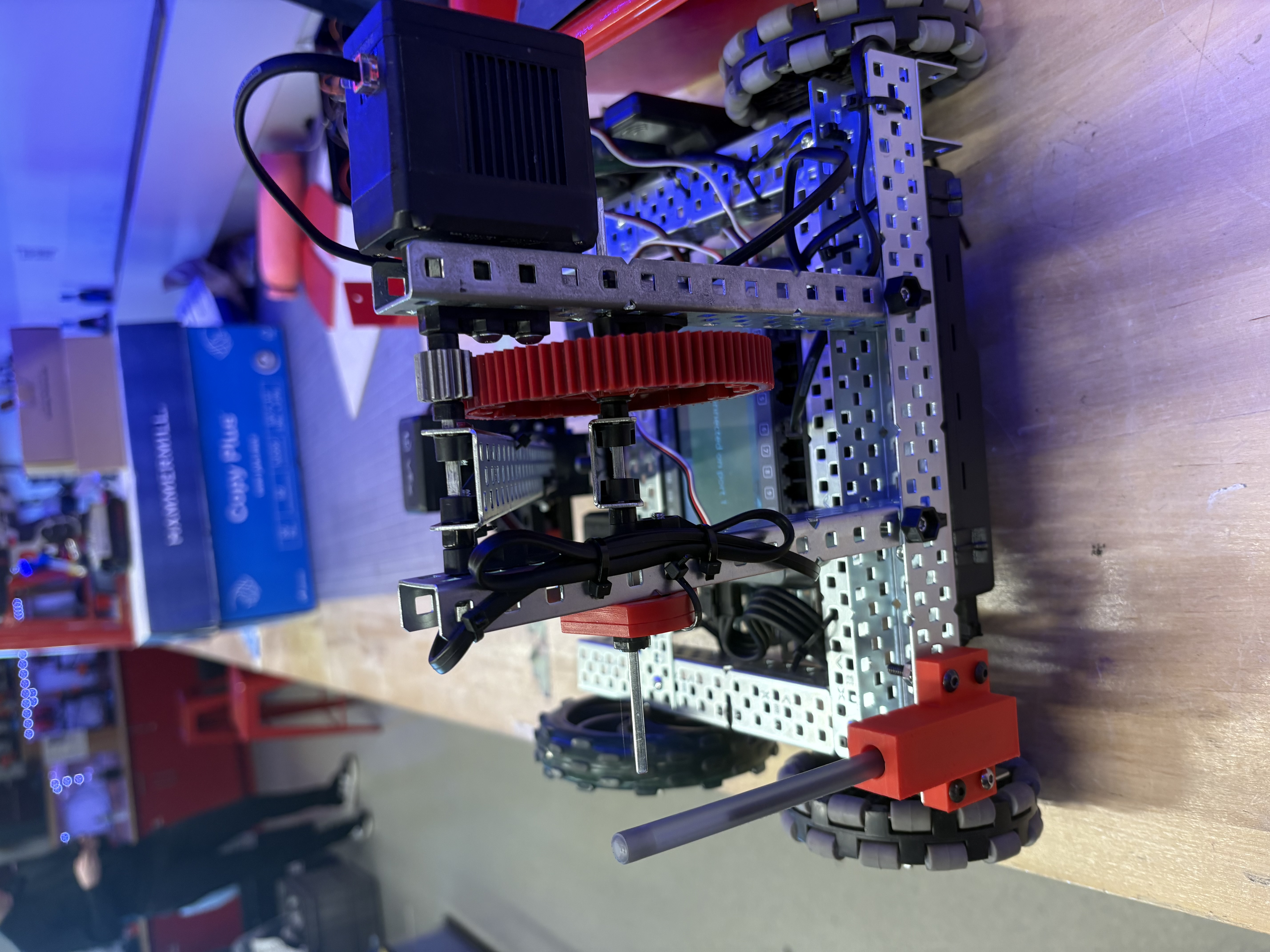 Earlier version of our VEX robot showing the arm and gearing